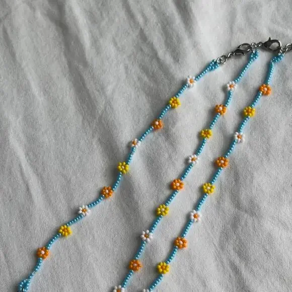 Yellow and blue beaded flower - Picture 1 of 3